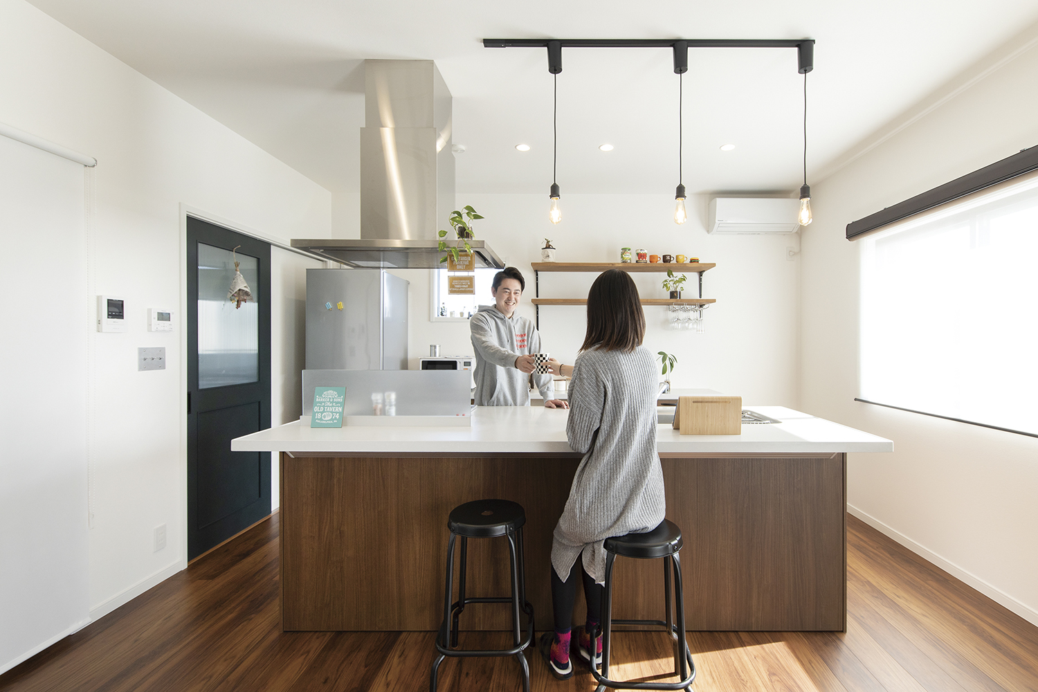 ヴィンテージの風合いを愉しむ要望を叶えた店舗併用住宅